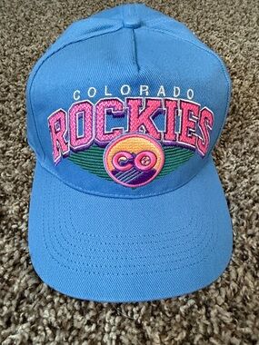 Genuine Merchandise Colorado Rockies Blue Cap with Pink and Green Logo